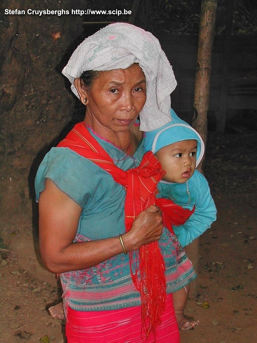 Chiang Mai - Woman with child We are staying in a small and primitive out-of-the-way village of the Karen. Stefan Cruysberghs